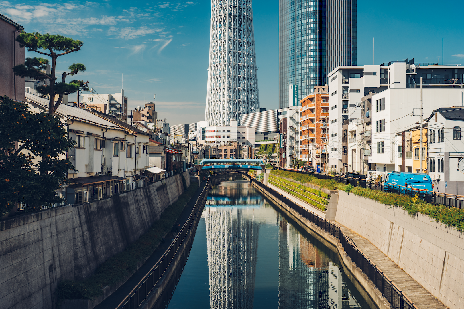 View of the base of the Tokyo Skytree from a nearby canal