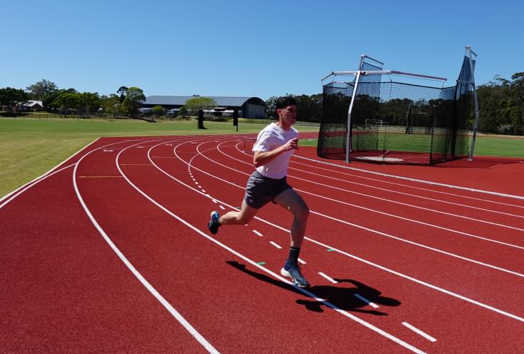 Image of Mackenzie on a running track - image shot by the Sony ZV-1F camera